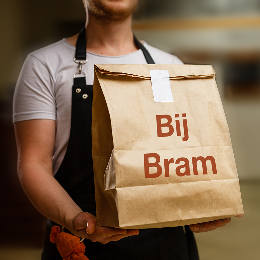 diverse of paper containers for takeaway food. delivery man is c